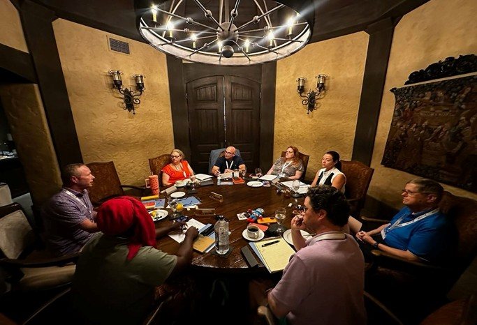 Amanda co-facilitating a firm-owner leadership retreat roundtable